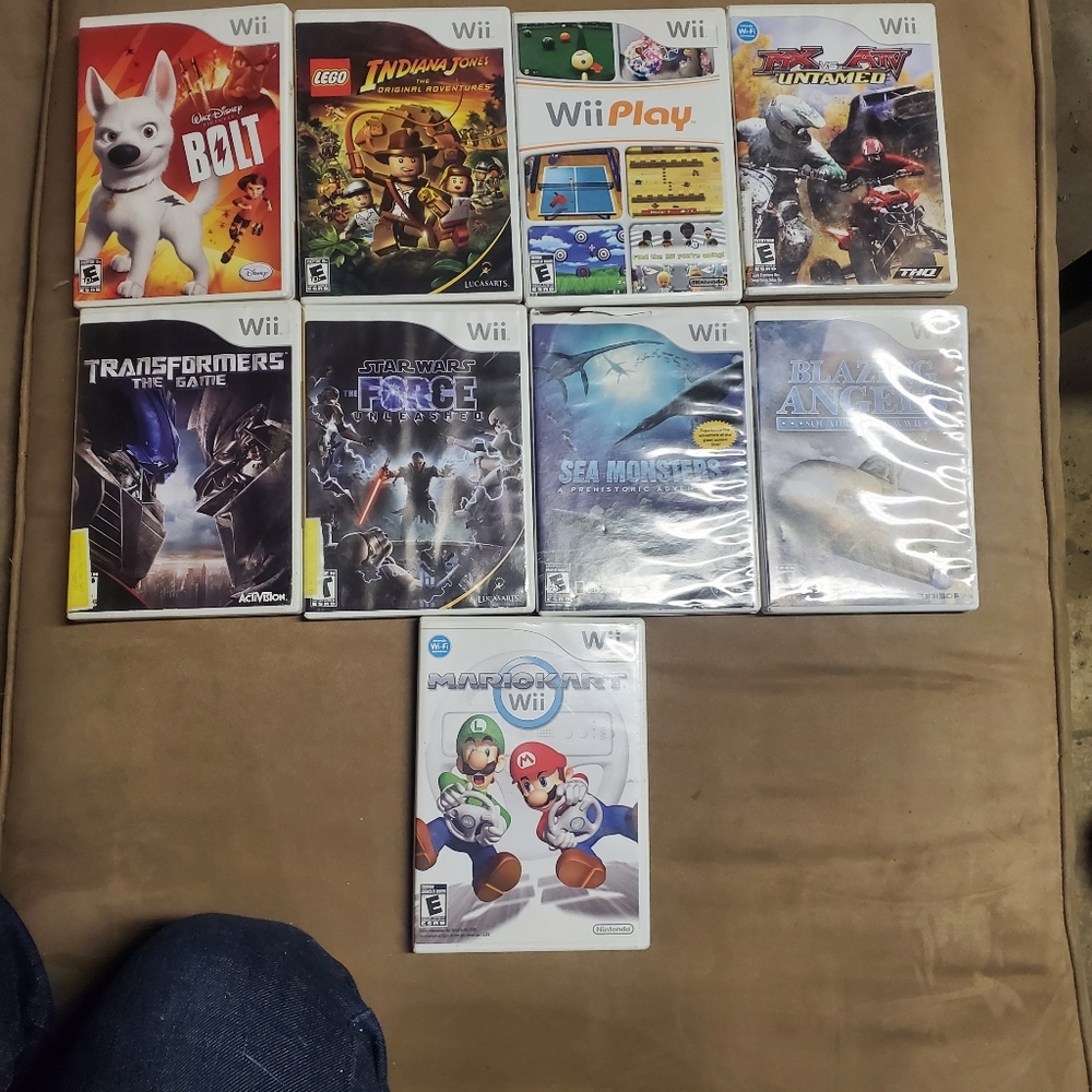 Wii games, bolt Disney,  mario cart, star wars,